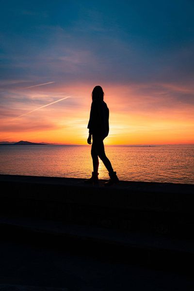 walking into sunset